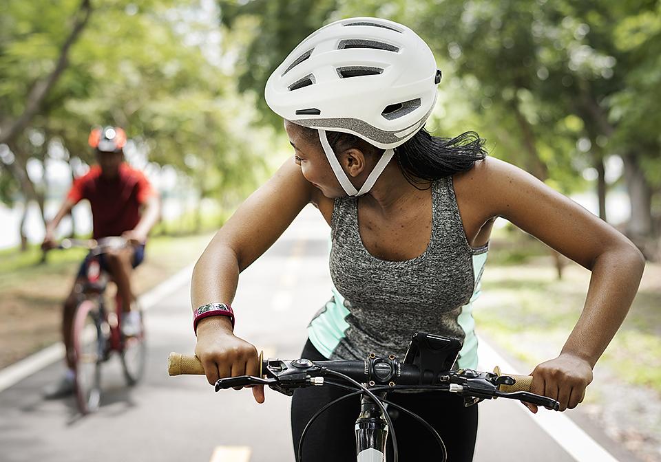 riding a bike on a trail