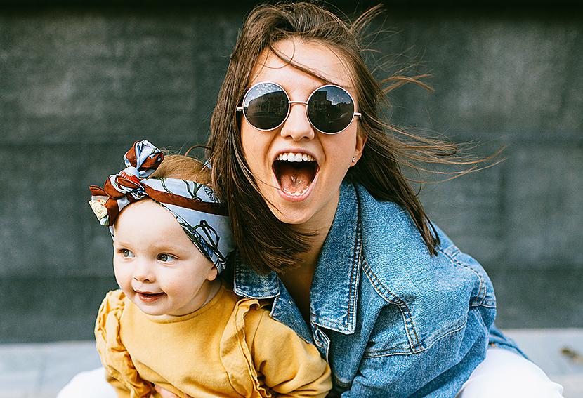 Mom smiling with baby